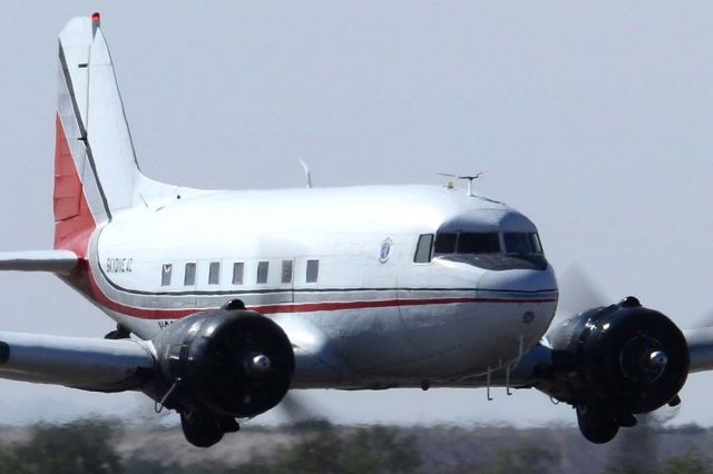 Douglas DC-3 (N86584) - Skydive Arizona DC-3 N86584 made an impressive low pass at the Copperstate Fly-in at Casa Grande.