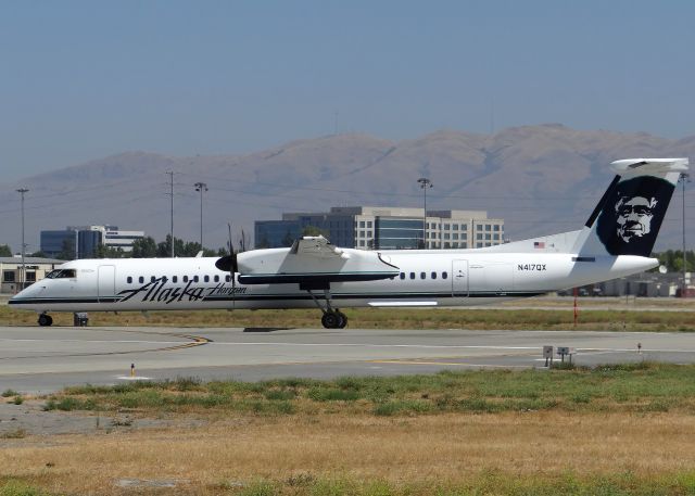 de Havilland Dash 8-400 (N417QX) - Taking off Runway 30L