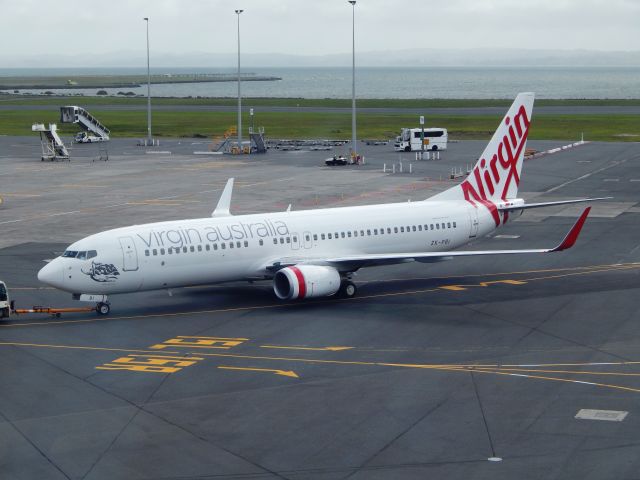 Boeing 737-800 (ZK-PBI) - Virgin Australia B737 800 reg ZK-PBI departs AKL on 31 October 2014.