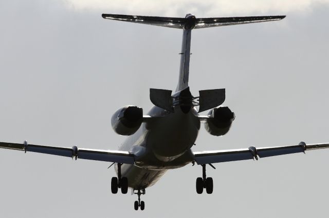 — — - Air brakes deployed on a KLM Fokker F-28.