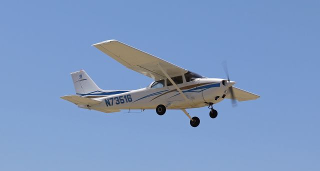Cessna Skyhawk (N73516) - An experienced and highly capable pilot was at the controls of this Cessna as it was landing at Harris Ranch Airport (3O8). There was a rather sporadic crosswind blowing across Runway 32 as N73516 made its s/final approach. It had crossed over the numbers and was not very many feet over the runway when an extremely strong crosswind blast twisted it into an unstable left-wing-high angle and also pushed it out of alignment with the runway. It looked like the plane was about to be forced down into the ground off the east edge of the runway but the pilot put the throttle to the firewall and lifted away into the "go-around" seen here. It was a smoothly executed recovery from what had appeared to be an unavoidable off-runway impact.br /The Cessna landed without incident on the second try.