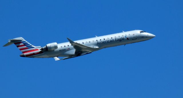 Canadair Regional Jet CRJ-900 (N519AE) - Shortly after departure is this 2003 American Airlines Eagle Canadair Regional Jet 701ER in the Summer of 2022.