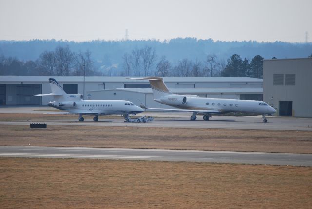 — — - N98NX parked next to N500RH in front of the Hendrick Motorsports hangar at Concord Regional Airport (Concord, NC) - 2/10/09