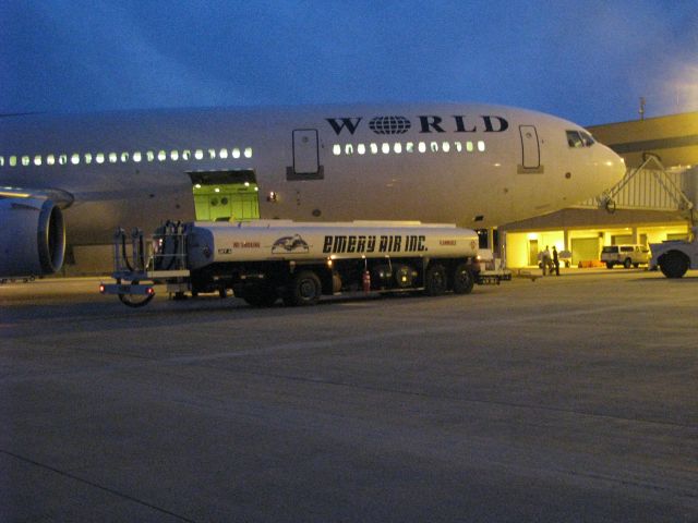 Boeing MD-11 — - MD-11 loading at Gate 3 RFD as part of the Oprah Vacation of a Lifetime charter.