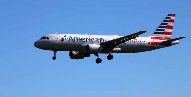 Airbus A320 (N122US) - On final is this 2000 American Airlines Airbus 320-214 in the Spring of 2021.