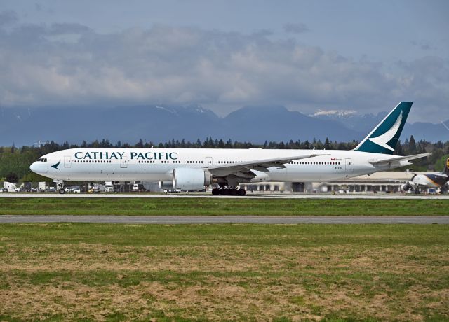 BOEING 777-300ER (B-KQF) - CX title in large font