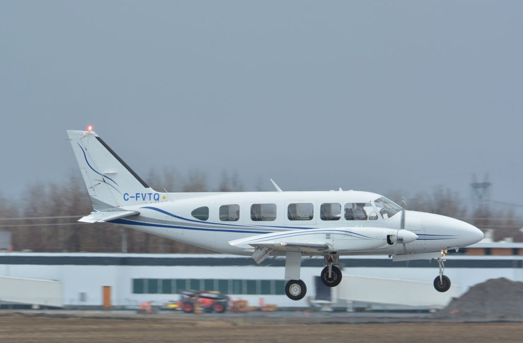 Piper Navajo (C-FVTQ) - Landing on 24R in CYHU. 04-06-2025