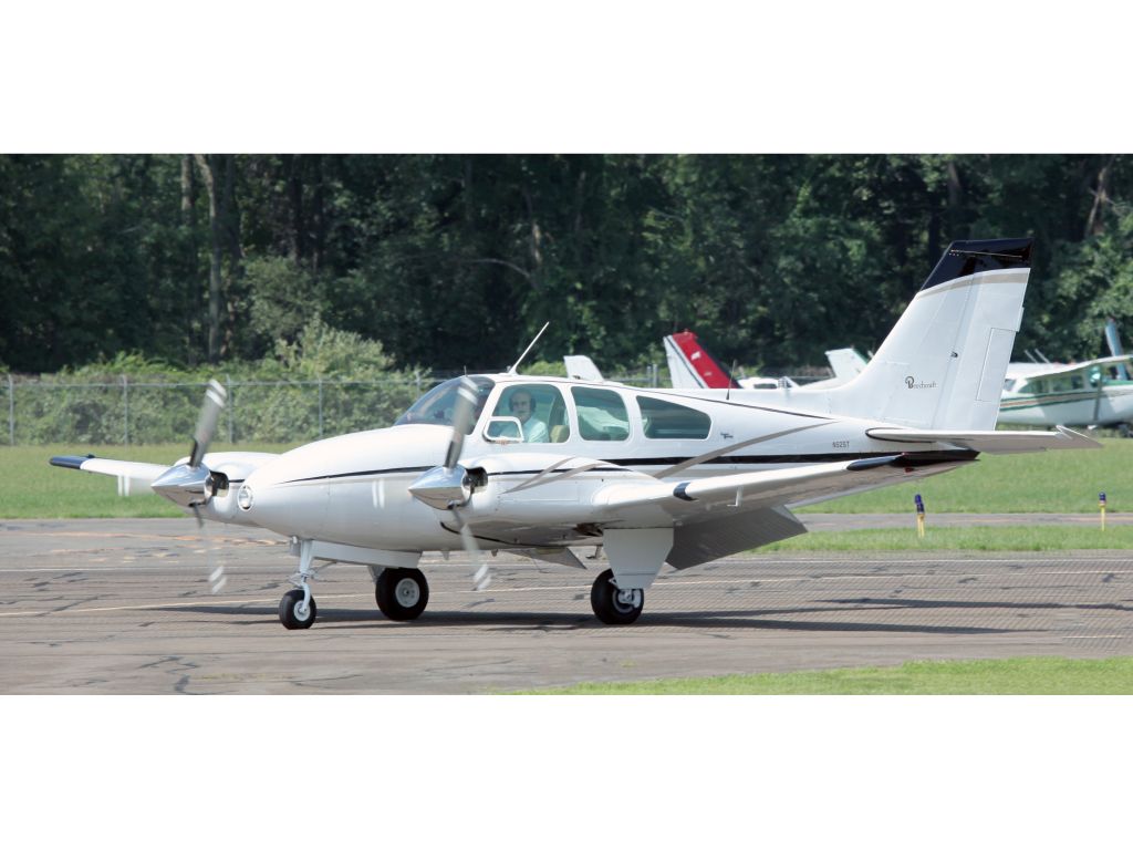 Beechcraft 55 Baron (N525T) - This is a very nice Baron BE55. Rollout after a smooth landing runwat 26 at Danbury.