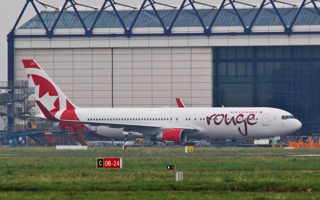 BOEING 767-300 (C-FMWV) - air canada rouge b767-300er c-fmwv at lufthansa technik  in shannon 25/10/16.