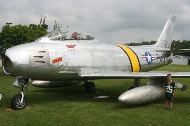 — — - F-86 Sabre Painted to Look Like Gabby Gabrieskis Jet and Young Green Bay Packer at EAA Museum Oshkosh, WI