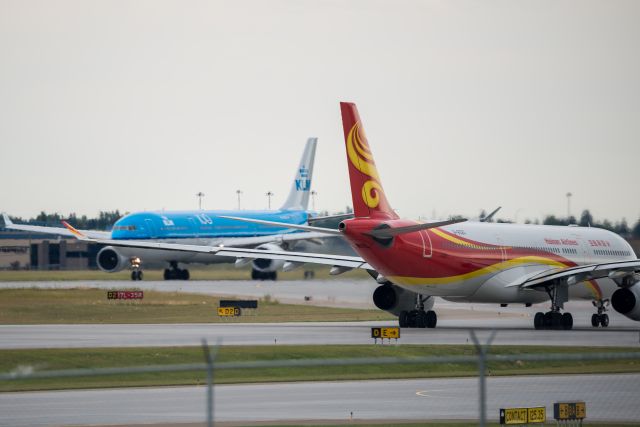 Airbus A330-300 (B-6520) - A couple of France's best looking airliners pass each other leaving Calgary.