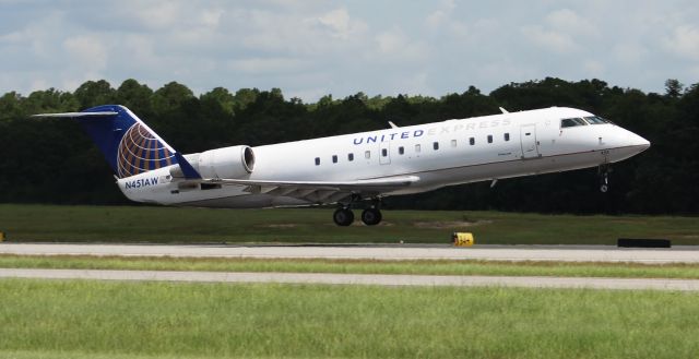 Canadair Regional Jet CRJ-200 (N451AW) - A Bombardier CRJ-200LR departing Runway 8 at Pensacola International Airport, FL - early afternoon July 19, 2019.