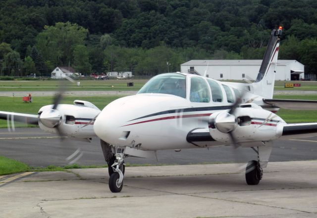 N8111M — - One of the three Barons of RELIANT AIR has just landed. RELIANT AIR has the lowest fuel price on the Danbury (KDXR) airpor.