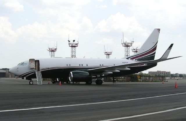 N134AR — - Boeing 737-7AH (BBJ) N134AR rest between flight at 5 Towers at KLGA on July 17,2004. Note their are only 8 cabin windows on the left side of the fuselage, unusual even for a BBJ. This Beautiful aircraft still visits LGA regularly wearing  an even more beautiful scheme now registered N888TY.