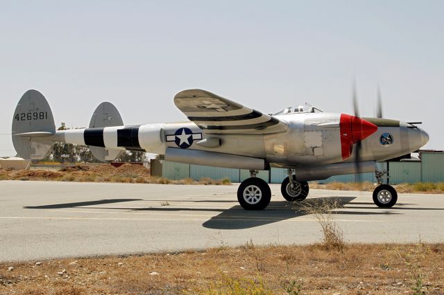 NL7723C — - A Lockheed P-38L Lightning just about to take off out of Rialto airport.