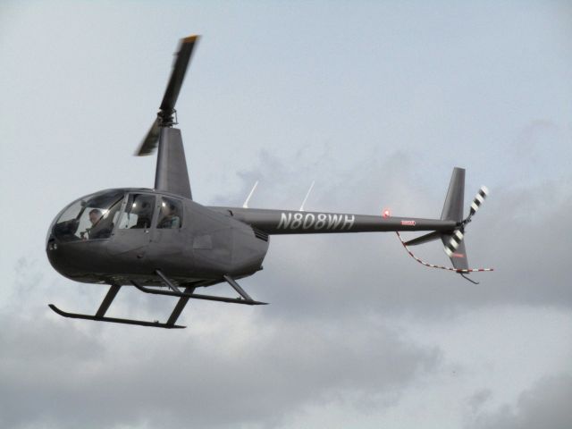 Robinson R-44 (N808WH) - Lifting off over RWY 24