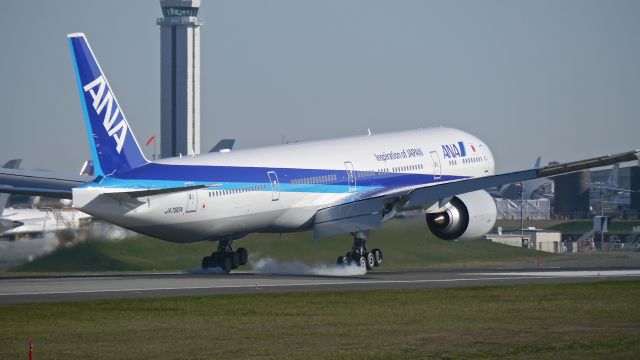 BOEING 777-300 (JA790A) - BOE5 touching down on Rwy 16R to complete a ferry flight from KVCV on 3/9/15. (ln 1283 / cn 60136). The aircraft was returning after being painted.