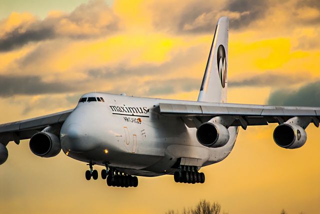 Antonov An-124 Ruslan (UR-ZYD) - Landing just as the sun goes down an d day turn to night in a winter month at ENGM! A rare visitor cargo airline.