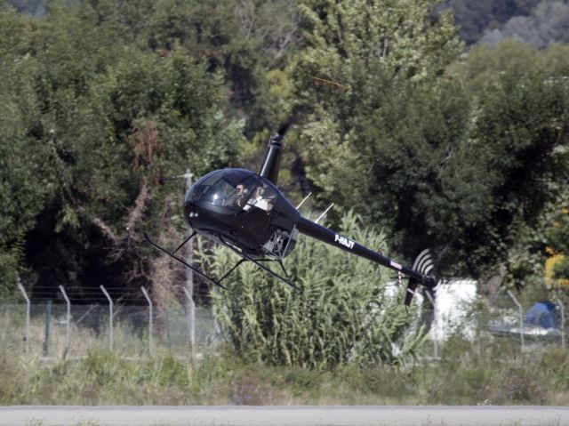 Robinson R-22 (F-HAJT) - Auto-rotation training at Cannes France.