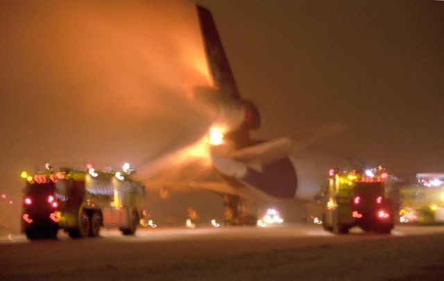 McDonnell Douglas DC-10 — - Catastrophic engine failure on March 6, 2001 during a snow storm. Sorry for the quality, I took this picture driving with my elbows, through a snowy windshield. This aircraft was repaired and flew again.