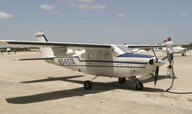 Cessna Centurion (N5457A) - Pressurized. Note the radar pod under the RH wing.