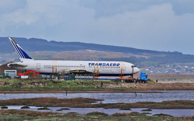 BOEING 767-200 (EI-CZD) - transaero b767-200er ei-czd waiting for high tide in a couple of days so it can be loaded on a barge for its final journey to a glamping site in co.sligo ireland 2/5/16.