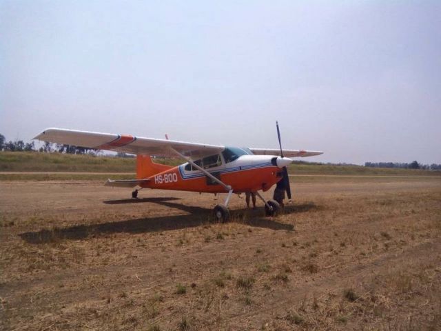 Cessna Skywagon 180 (HS-BOO) - taken at military training field near Bangkok