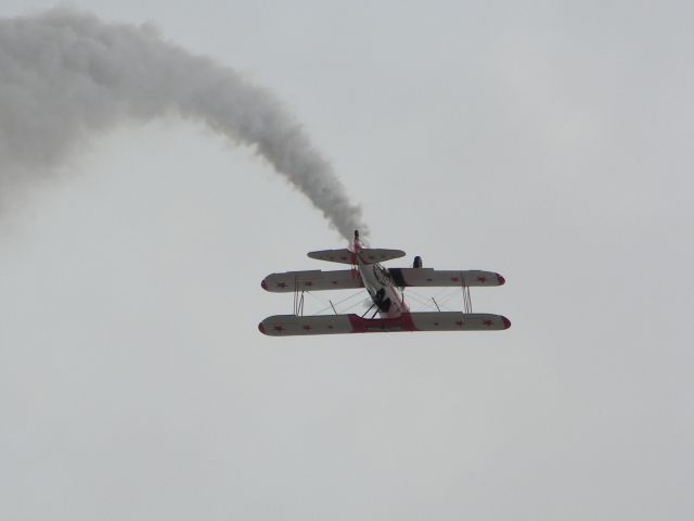 — — - MCAS Miramar Airshow 2007  San Diego, CA  Slow right barrel roll. Retired Red Baron Pizza Team.