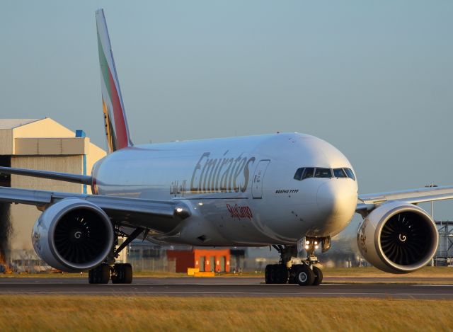 Boeing 777-200 — - A Emirates Skycargo B777-200LRF about to depart LHR for the first time. Will be seen on here on a regular basis in the future.
