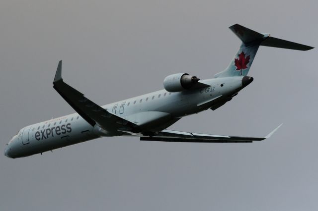 Canadair Regional Jet CRJ-900 (C-GFJZ) - Off to Halifax (YHZ/CYHZ) as dark cloud moving in.