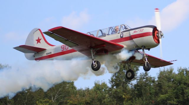 N2045Q — - A Yakovlev 52 releasing smoke just after takeoff from Moontown Airport, Brownsboro, AL, during the EAA 190 Annual Fly-In - September 16, 2017.