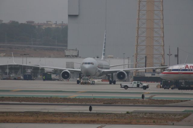 BOEING 767-300 (N386AA) - BEING TOWED TO THE GATE