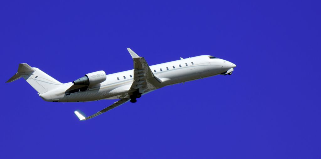 Canadair Regional Jet CRJ-200 (N858SJ) - Shortly after departure is this 2006 Canadair Regional Jet 200ER in the Summer of 2024.