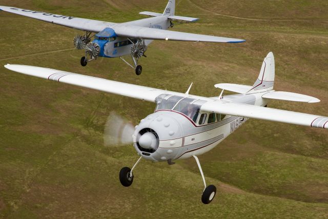 Ford Tri-Motor (NC8407) - N1950C, the last 195 off the factory line and NC8407, EAAs Trimotor, formed up enroute to San Carlos