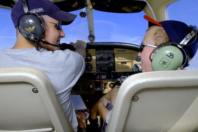 Piper Cherokee (N6911J) - My F/O (and son) Parris building some time and memories.