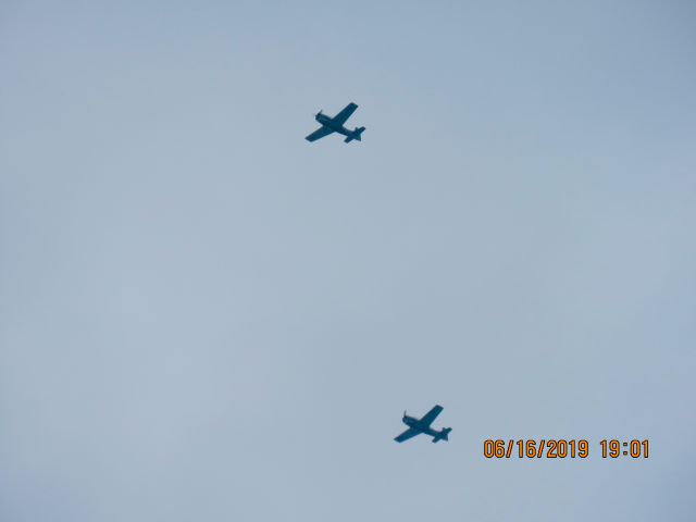 North American Trojan (N9060F) - Trojan Phlyers heading back home over Southeastern Kansas from their airshow at KSZL. 