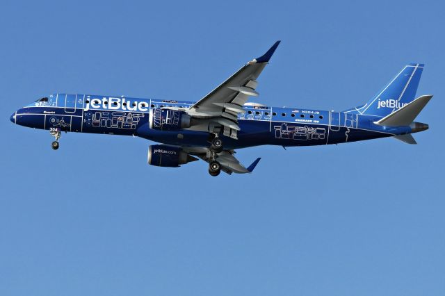 Embraer ERJ-190 (N304JB) - Here is the JetBlue E190 special livery named "Blueprint" (N304JB) landing on runway 27.