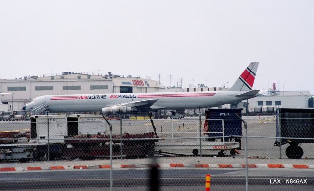 Boeing 777-200 (N846AX) - KLAX - Airborne Express DC-8 at cargo south of 25L. Hit "Full" to see larger version picture, Scan from print. Original delivery to Japan Airlines 1970-71.
