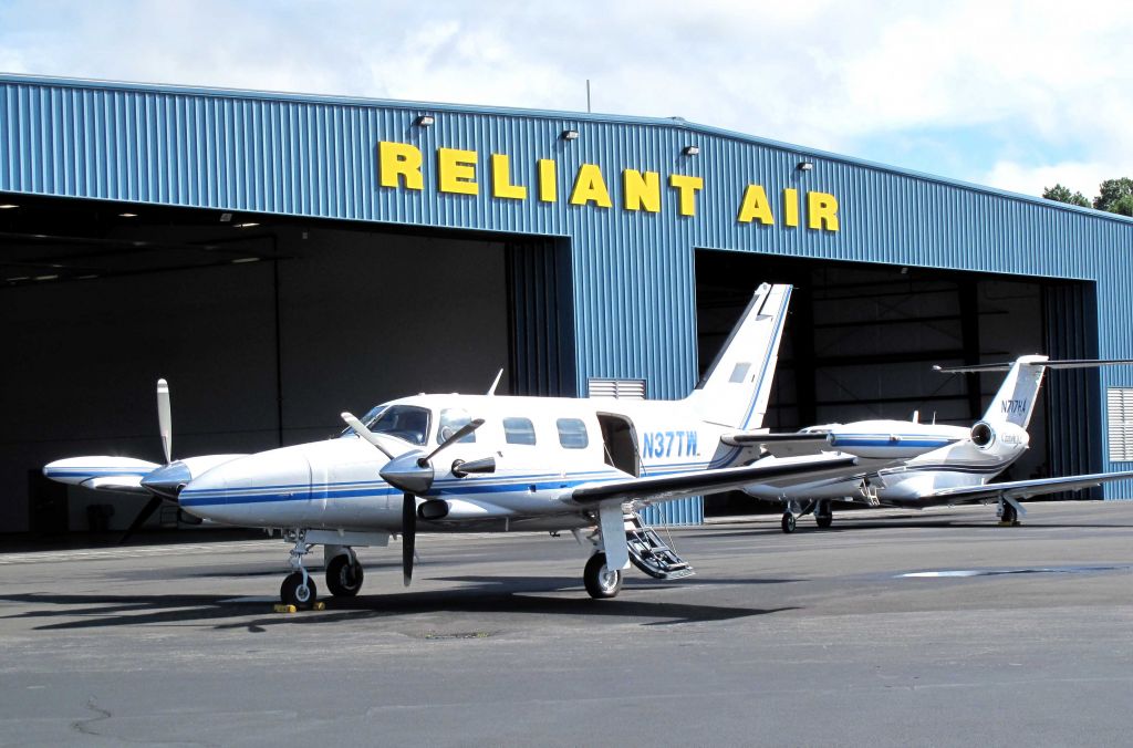 Piper Cheyenne (N37TW) - The ramp at RELIANT AIR - where you find the cheapest fuel on the Danbury (KDXR) airport!