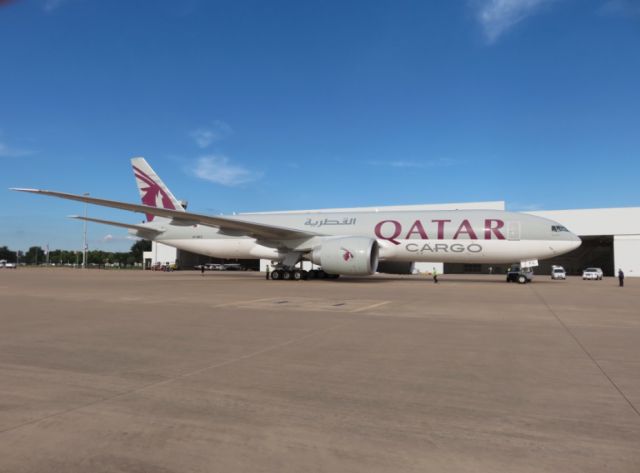 Boeing 777-200 (A7-BFC) - Unloading the aircraft for the Red Bull Air Races at Texas Motor Speedway.