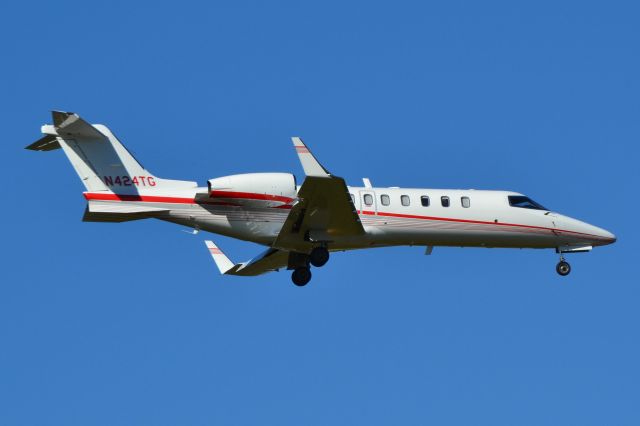 Learjet 45 (N424TG) - TLI AVIATION LLC on final at KCLT - 10/24/18