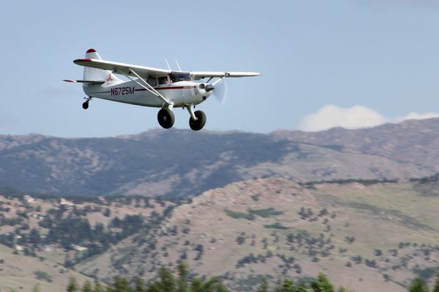 Piper 108 Voyager (N6725M) - Awesome "Super Stinson" - the tail art isnt to shabby either. Boulder Airport Day 2012