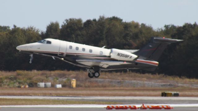Embraer Phenom 300 (N358FX) - Flexjet 358 departing to Lakeland, FL.
