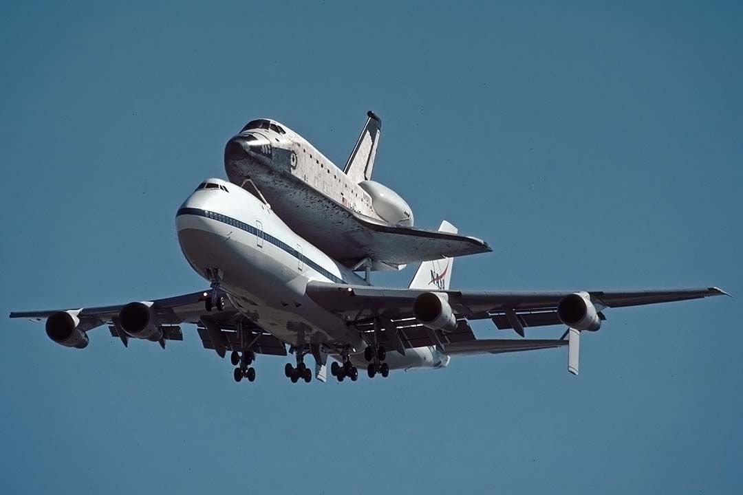 BOEING 747-100 (N905NA) - The space shuttle orbiter Columbia OV-102 was delivered to Air Force Plant 42 at Palmdale, California on Saturday, September 25, 1999 on the back of Boeing 747 Shuttle Carrier Aircraft (SCA) N905NA. It was housed at Boeings Orbiter Assembly Facility during an eightteen-month orbiter maintenance down period.