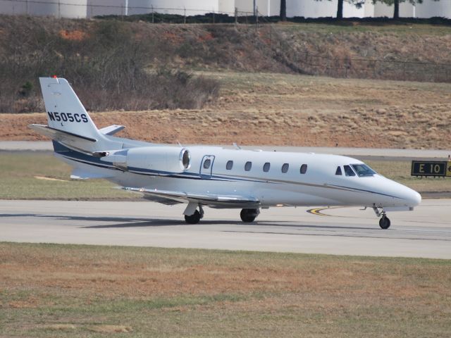 Cessna Citation Excel/XLS (N505CS) - Taking of on runway 18C at CLT - 3/11/09