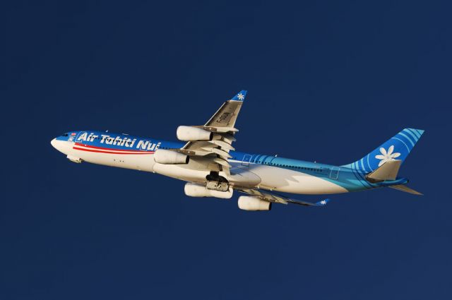 F-OSUN — - An Air Tahiti Nui operated Airbus A340-300 series widebody quad-jet takes to the skies in the late afternoon after liftoff from the Los Angeles International Airport, LAX, in Westchester, Los Angeles, California