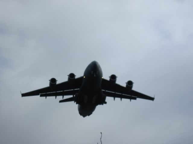 Boeing Globemaster III — - C-17 doing touch and goes at the local airport