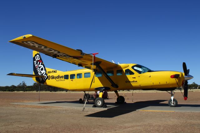 Cessna Caravan (VH-FMX) - Waiting for another load of adrenaline junkies.