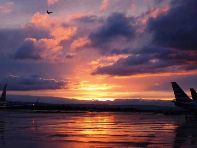 — — - Sunset at PDX.