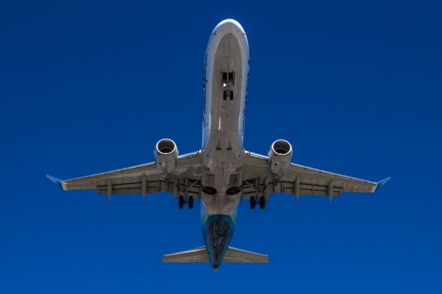 — — - Landing at San Diego International Airport